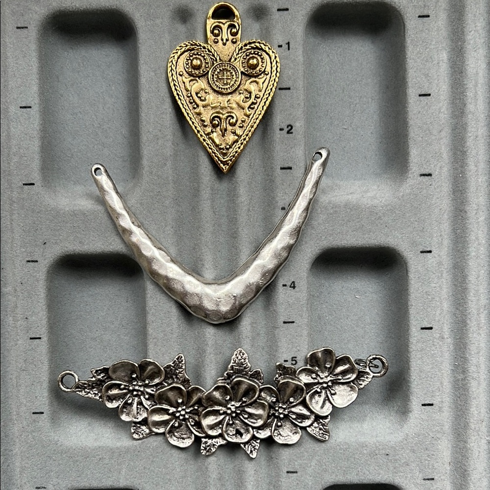Three handmade Pendants